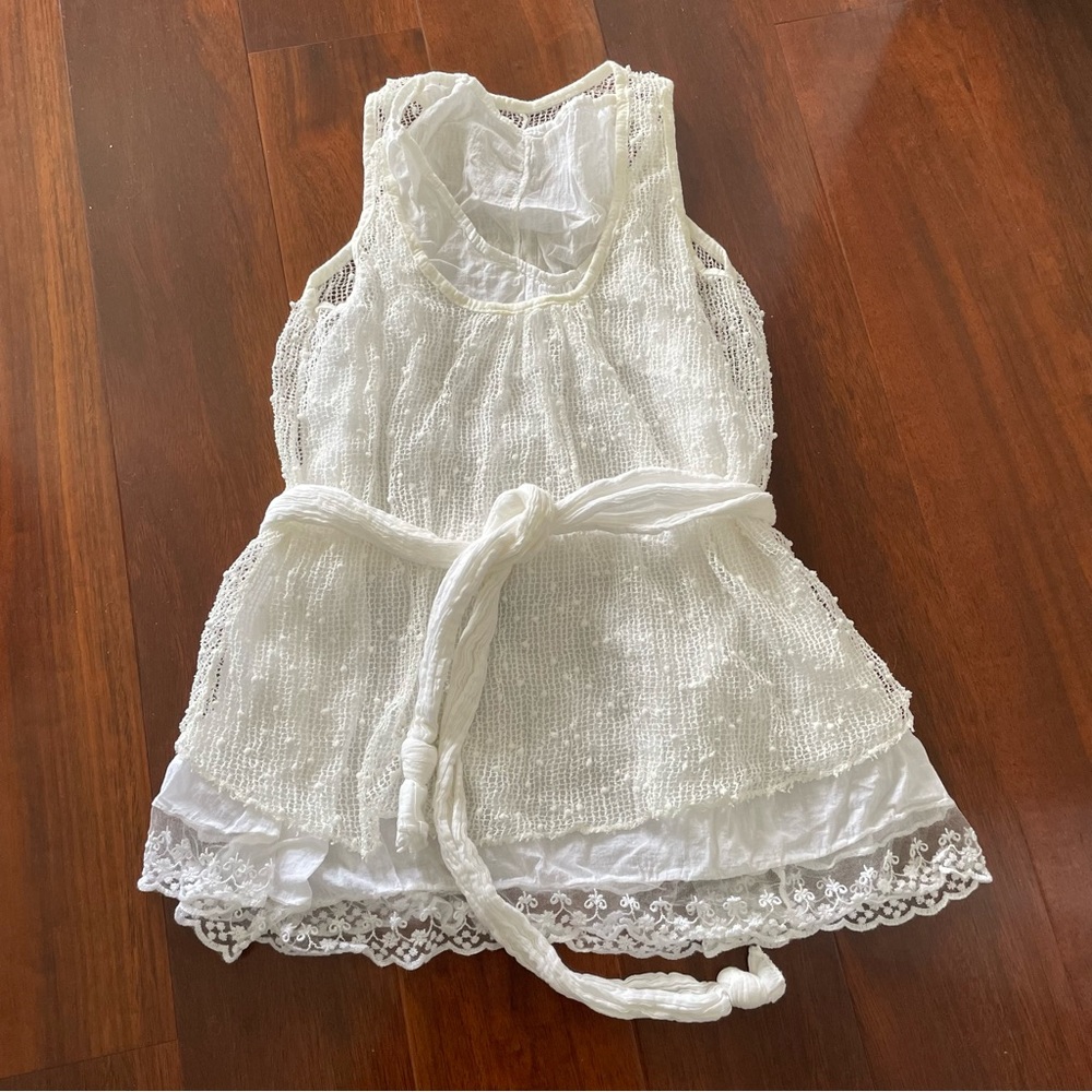 Layered white lace top with a belt